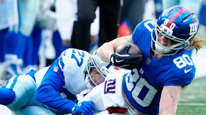 New York Giants wide receiver Gunner Olszewski (80) is tackled by Dallas Cowboys cornerback Reddy Steward (27) after getting a first down, ]Sunday, January 4, 2026, in East Rutherford.