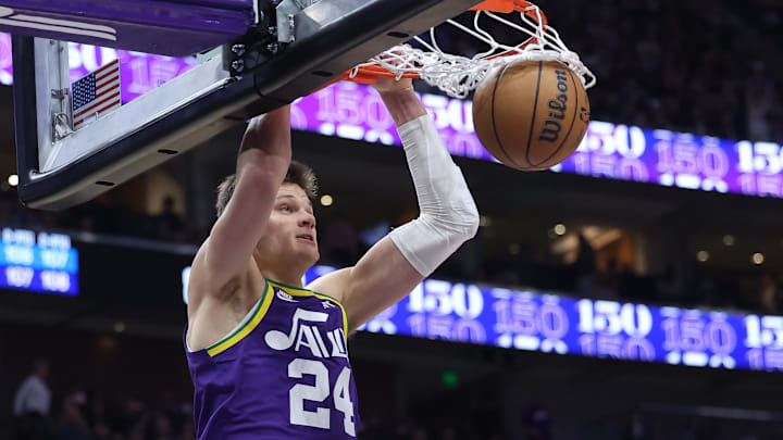 Dec 13, 2023; Salt Lake City, Utah, USA; Utah Jazz center Walker Kessler (24) dunks the ball against the New York Knicks during the third quarter at Delta Center. Mandatory Credit: Rob Gray-Imagn Images