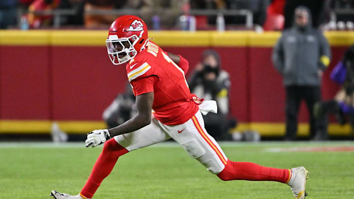 Dec 7, 2025; Kansas City, Missouri, USA; Kansas City Chiefs wide receiver Xavier Worthy (1) runs with the ball during the third quarter against the Houston Texans at GEHA Field at Arrowhead Stadium. Mandatory Credit: Amy Kontras-Imagn Images