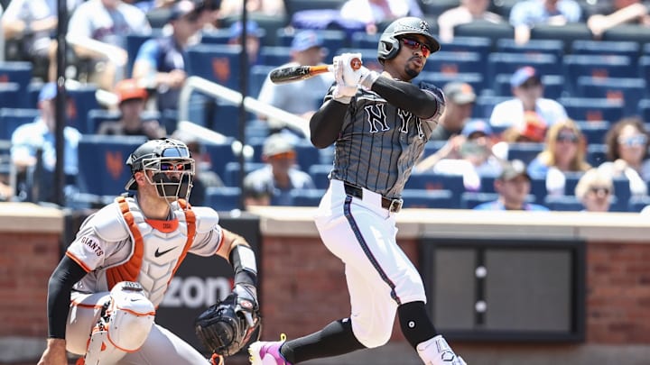 May 25, 2024; New York City, New York, USA;  New York Mets shortstop Francisco Lindor (12) hits a double in the first inning against the San Francisco Giants at Citi Field. Mandatory Credit: Wendell Cruz-USA TODAY Sports