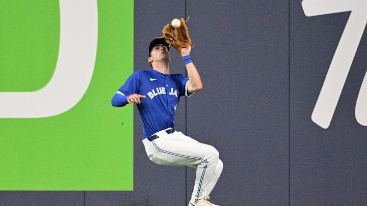 Toronto Blue Jays center Joey Loperfido (9) catches a fly ball hit by Miami Marlins third baseman Connor Norby (not shown) in the sixth inning at Rogers Centre on Sept 28. Toronto Blue Jays center Joey Loperfido (9) catches a fly ball hit by Miami Marlins third baseman Connor Norby (not shown) in the sixth inning at Rogers Centre on Sept 28.