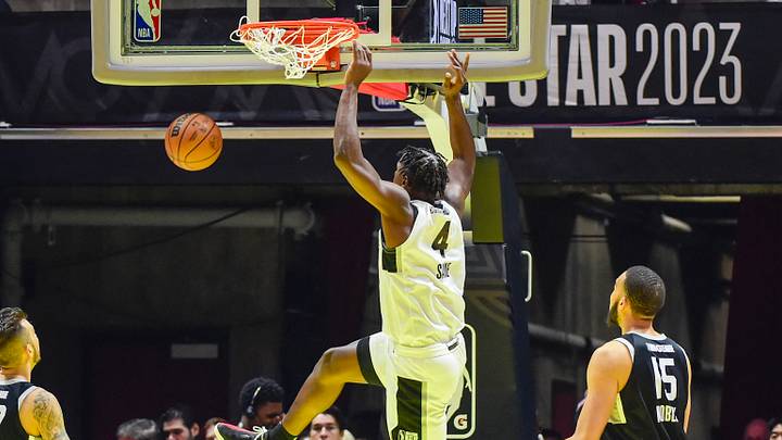 Feb 19, 2023; Salt Lake City, UT, USA; Team Scoot forward Babacar Sane (4) makes a slam dunk over Team Luka small forward Isaiah Mobley (15) during the first half at the Jon M. Huntsman Center. Feb 19, 2023; Salt Lake City, UT, USA; Team Scoot forward Babacar Sane (4) makes a slam dunk over Team Luka small forward Isaiah Mobley (15) during the first half at the Jon M. Huntsman Center.