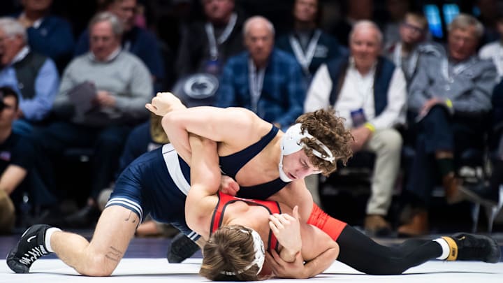 Penn State's Mitchell Mesenbrink wrestles Ohio State's Bryce Hepner at 165 pounds in their 2024 Big Ten match.