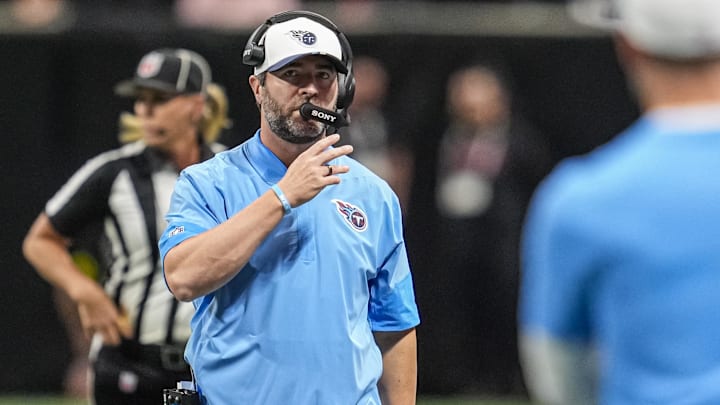 Aug 15, 2025; Atlanta, Georgia, USA; Tennessee Titans head coach Brian Callahan reacts on the bench during the game against the Atlanta Falcons at Mercedes-Benz Stadium. Mandatory Credit: Dale Zanine-Imagn Images