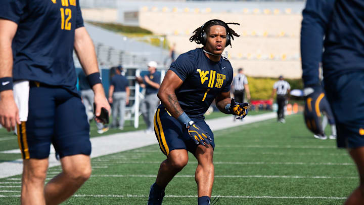 West Virginia running back Jahiem White warms up before the start of an NCAA football game against Penn State, Dan Rainville / USA TODAY NETWORK