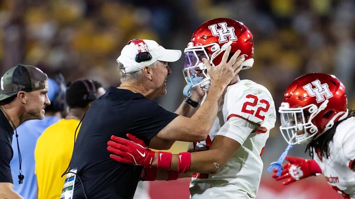 Oct 25, 2025; Tempe, Arizona, USA; Houston Cougars head coach Willie Fritz celebrates a play with defensive back Marc Stampley II (22) against the Arizona State Sun Devils at Mountain America Stadium. Mandatory Credit: Mark J. Rebilas-Imagn Images Oct 25, 2025; Tempe, Arizona, USA; Houston Cougars head coach Willie Fritz celebrates a play with defensive back Marc Stampley II (22) against the Arizona State Sun Devils at Mountain America Stadium. Mandatory Credit: Mark J. Rebilas-Imagn Images