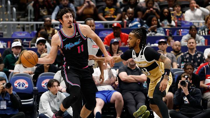 Apr 10, 2026; Washington, District of Columbia, USA; Miami Heat forward Jaime Jaquez Jr. (11) passes the ball as Washington Wizards guard Sharife Cooper (13) defends in the second half at Capital One Arena. Mandatory Credit: Geoff Burke-Imagn Images Apr 10, 2026; Washington, District of Columbia, USA; Miami Heat forward Jaime Jaquez Jr. (11) passes the ball as Washington Wizards guard Sharife Cooper (13) defends in the second half at Capital One Arena. Mandatory Credit: Geoff Burke-Imagn Images