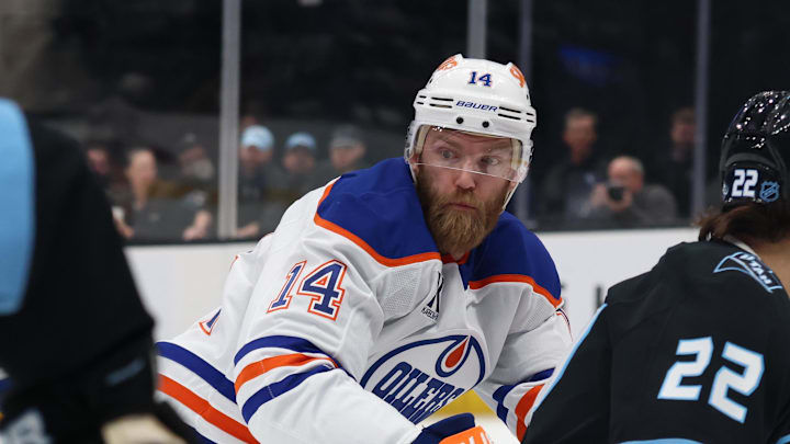 Mar 24, 2026; Salt Lake City, Utah, USA; Edmonton Oilers defenseman Mattias Ekholm (14) looks for the play against the Utah Mammoth during the first period at Delta Center. Mandatory Credit: Rob Gray-Imagn Images