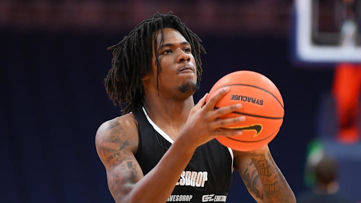 Calvin Russell III, the SU two-sport star who is rehabbing an injury, says he will play for Syracuse basketball next season. Calvin Russell III, the SU two-sport star who is rehabbing an injury, says he will play for Syracuse basketball next season.