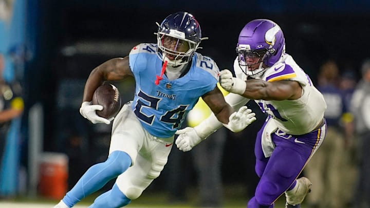 Tennessee Titans running back Jordan Mims (24) is stopped by Minnesota Vikings linebacker Kobe King (41) during the third quarter of an NFL pre-season game at Nissan Stadium in Nashville, Tenn., Friday, Aug. 22, 2025. Tennessee Titans running back Jordan Mims (24) is stopped by Minnesota Vikings linebacker Kobe King (41) during the third quarter of an NFL pre-season game at Nissan Stadium in Nashville, Tenn., Friday, Aug. 22, 2025.