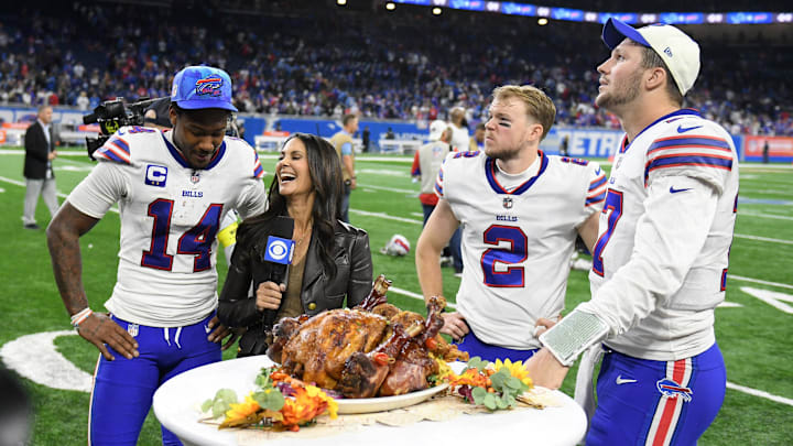 Nov 24, 2022; Detroit, Michigan, USA;  Buffalo Bills wide receiver Stefon Diggs (14) kicker Tyler Bass (2) and quarterback Josh Allen (17) talk with CBS reporter Tracy Wolfson after the Bills beat the Detroit Lions at Ford Field.