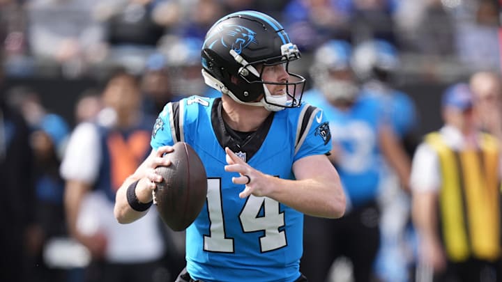 Oct 26, 2025; Charlotte, North Carolina, USA; Carolina Panthers quarterback Andy Dalton (14) throws during the first half against the Buffalo Bills at Bank of America Stadium. 