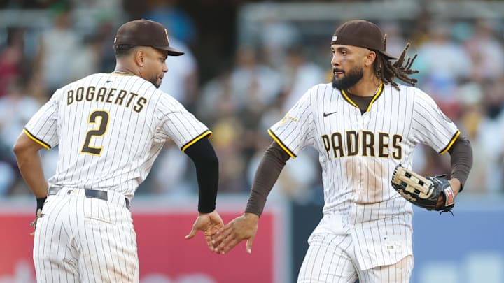 Jul 12, 2025; San Diego, California, USA; San Diego Padres right fielder Fernando Tatis Jr. (23) celebrates with shortstop Xander Bogaerts (2) after defeating the Philadelphia Phillies at Petco Park. Mandatory Credit: David Frerker-Imagn Images