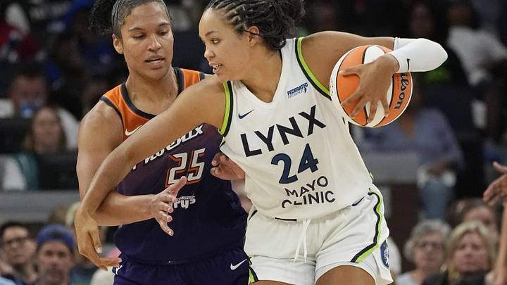 Jul 16, 2025; Minneapolis, Minnesota, USA; Minnesota Lynx forward Napheesa Collier (24) works around Phoenix Mercury forward Alyssa Thomas (25) in the fourth quarter at Target Center. Mandatory Credit: Bruce Kluckhohn-Imagn Images