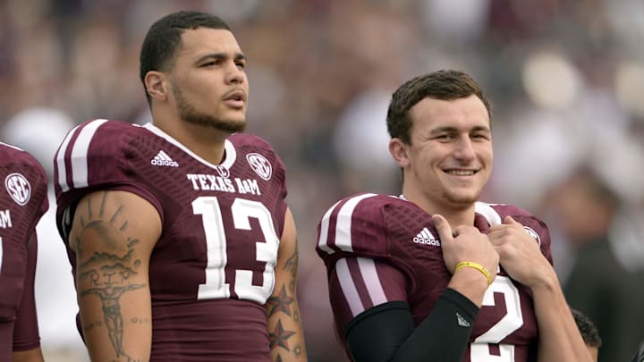 Nov 9, 2013; College Station, TX, USA; Texas A&M Aggies quarterback Johnny Manziel (2) and wide receiver Mike Evans (13) before the game against the Mississippi State Bulldogs at Kyle Field. Mandatory Credit: Thomas Campbell-Imagn Images
