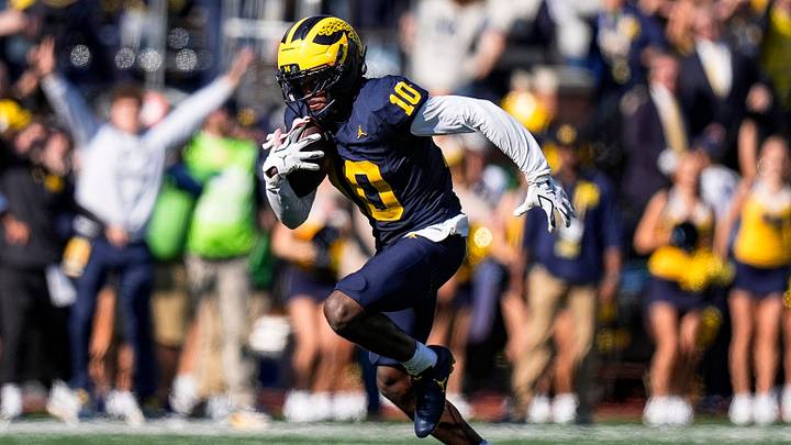 Michigan cornerback Zeke Berry (10) runs after intercepting a pass intended for Indiana wide receiver Nick Marsh (11) during the second half at Michigan Stadium in Ann Arbor on Saturday, Oct. 24, 2026. Michigan cornerback Zeke Berry (10) runs after intercepting a pass intended for Indiana wide receiver Nick Marsh (11) during the second half at Michigan Stadium in Ann Arbor on Saturday, Oct. 24, 2026.