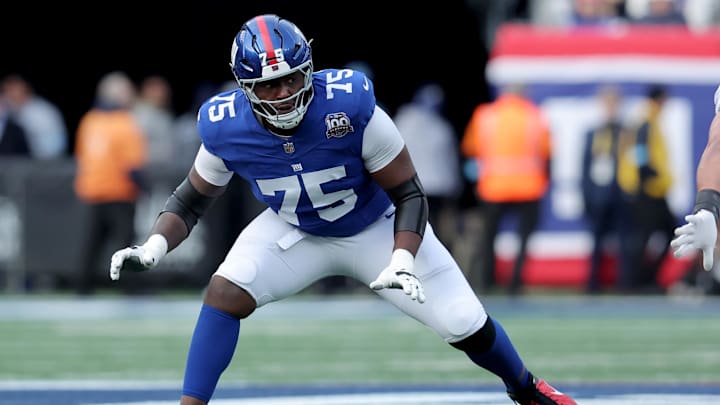 Dec 8, 2024; East Rutherford, New Jersey, USA; New York Giants guard Joshua Ezeudu (75) during the first quarter against the New Orleans Saints at MetLife Stadium. Dec 8, 2024; East Rutherford, New Jersey, USA; New York Giants guard Joshua Ezeudu (75) during the first quarter against the New Orleans Saints at MetLife Stadium.