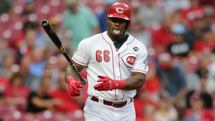 Cincinnati Reds right fielder Yasiel Puig (66) reacts after drawing a walk with the bases loaded in the second inning of an MLB baseball game against the Pittsburgh Pirates, Monday, July 29, 2019, at Great American Ball Park in Cincinnati. 

Pittsburgh Pirates At Cincinnati Reds July 29