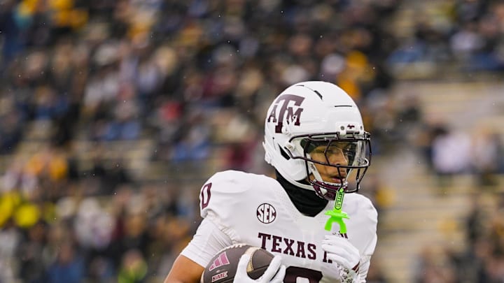 Nov 8, 2025; Columbia, Missouri, USA; Texas A&M Aggies wide receiver Izaiah Williams (0) warms up before a game against the Missouri Tigers at Faurot Field at Memorial Stadium. Mandatory Credit: Jay Biggerstaff-Imagn Images