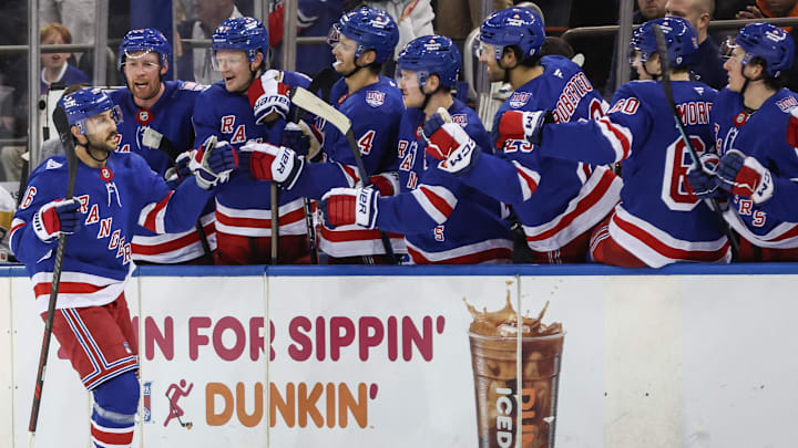 Feb 28, 2026; New York, New York, USA;  New York Rangers center Vincent Trocheck (16) celebrates with his teammates after scoring a goal during a shootout against the Pittsburgh Penguins at Madison Square Garden. Mandatory Credit: Wendell Cruz-Imagn Images