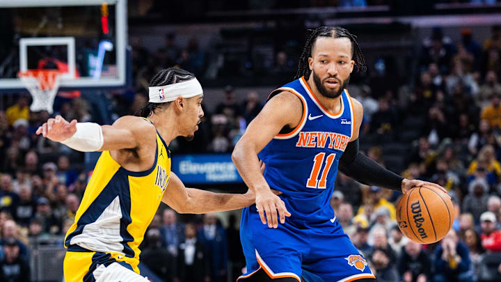 Dec 18, 2025; Indianapolis, Indiana, USA;  New York Knicks guard Jalen Brunson (11) dribbles the ball while  Indiana Pacers guard/forward Andrew Nembhard (2) defends in the second half at Gainbridge Fieldhouse. Mandatory Credit: Trevor Ruszkowski-Imagn Images