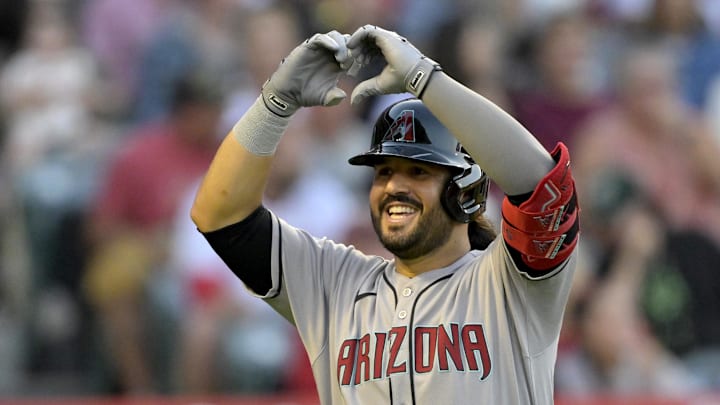 Jul 12, 2025; Anaheim, California, USA;  Arizona Diamondbacks third baseman Eugenio Suarez (28) celebrates after hitting his second solo home run of the game during the fourth inning against the Los Angeles Angels at Angel Stadium. Mandatory Credit: Jayne Kamin-Oncea-Imagn Images