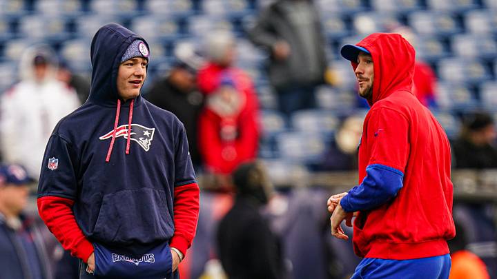 Jan 5, 2025; Foxborough, Massachusetts, USA; Buffalo Bills quarterback Josh Allen (17) and New England Patriots quarterback Drake Maye (10) talk on the field before the start of the game at Gillette Stadium. Mandatory Credit: David Butler II-Imagn Images