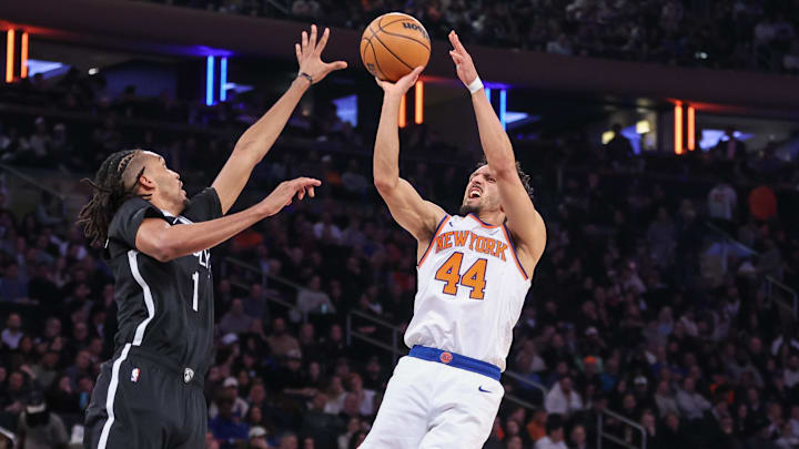 Jan 21, 2026; New York, New York, USA;  New York Knicks guard Landry Shamet (44) shoots over Brooklyn Nets forward Ziaire Williams (1) in the second quarter at Madison Square Garden. Mandatory Credit: Wendell Cruz-Imagn Images