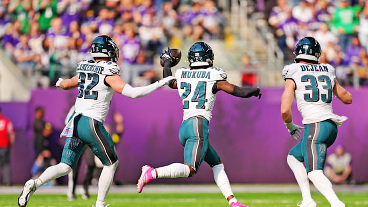 Philadelphia Eagles safety Andrew Mukuba (24) celebrates after making an interception during the second half against the Minnesota Vikings.