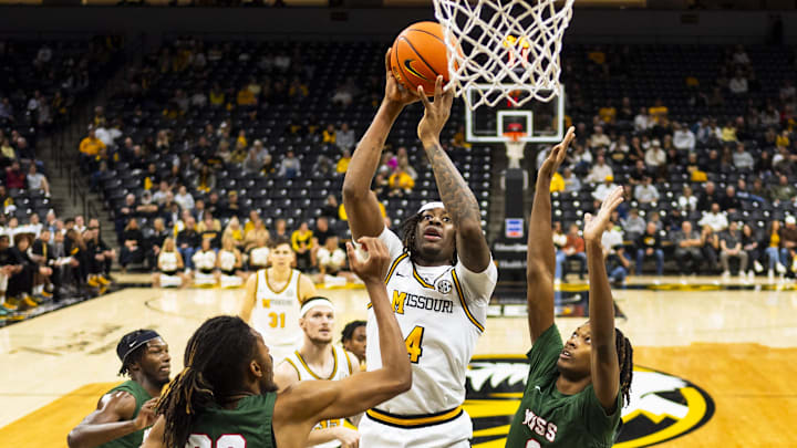 Nov 14, 2024; Columbia, Missouri, USA; Missouri Tigers guard Marcus Allen (4) shoots the ball during the first half against the Mississippi Valley State Delta Devils at Mizzou Arena. Mandatory Credit: Jay Biggerstaff-Imagn Images Nov 14, 2024; Columbia, Missouri, USA; Missouri Tigers guard Marcus Allen (4) shoots the ball during the first half against the Mississippi Valley State Delta Devils at Mizzou Arena. Mandatory Credit: Jay Biggerstaff-Imagn Images