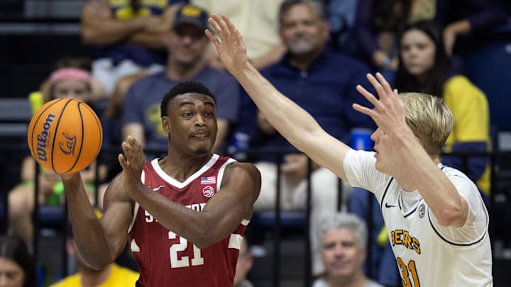 Dec 7, 2024; Berkeley, California, USA; Stanford Cardinal guard Jaylen Blakes (21) passes around California Golden Bears forward Rytis Petraitis (31) during the first half at Haas Pavilion. Mandatory Credit: D. Ross Cameron-Imagn Images Dec 7, 2024; Berkeley, California, USA; Stanford Cardinal guard Jaylen Blakes (21) passes around California Golden Bears forward Rytis Petraitis (31) during the first half at Haas Pavilion. Mandatory Credit: D. Ross Cameron-Imagn Images