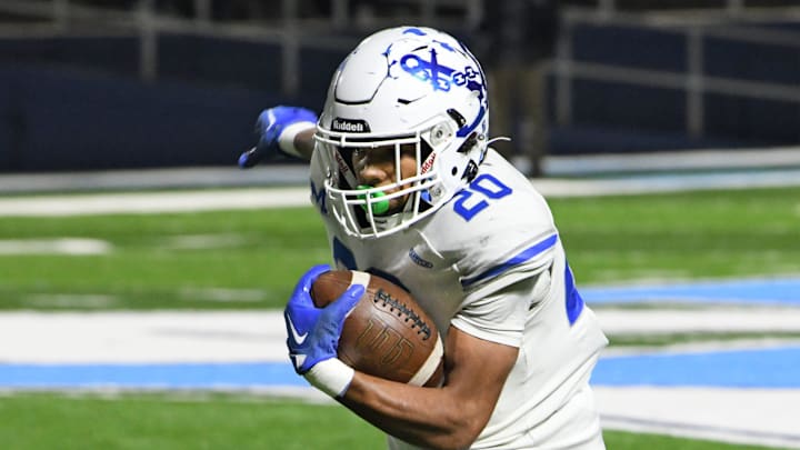 Mandeville's Nate Sheppard runs the ball against Airline in a quarterfinal playoff game Friday 11-24-23. Mandeville's Nate Sheppard runs the ball against Airline in a quarterfinal playoff game Friday 11-24-23.
