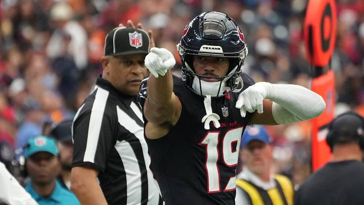 Nov 2, 2025; Houston, Texas, USA; Houston Texans wide receiver Xavier Hutchinson (19) reacts after a first down during the second half against the Denver Broncos at NRG Stadium. Mandatory Credit: Sean Thomas-Imagn Images