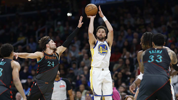 Feb 27, 2024; Washington, District of Columbia, USA; Golden State Warriors guard Klay Thompson (11) shoots a three-pointer vs. the Wizards. 