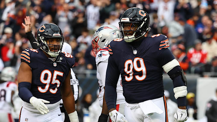 Gervon Dexter and DeMarcus Walker react after a big play earlier this season. The defensive front will need fixing in the offseason again for the Bears. Gervon Dexter and DeMarcus Walker react after a big play earlier this season. The defensive front will need fixing in the offseason again for the Bears.
