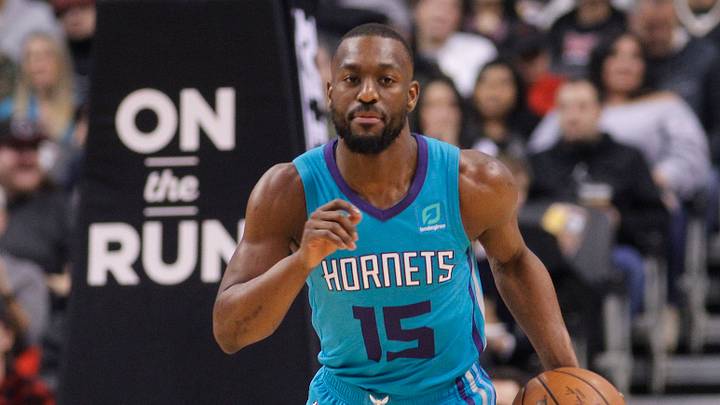 Charlotte Hornets guard Kemba Walker (15) dribbles up court against the Toronto Raptors Charlotte Hornets guard Kemba Walker (15) dribbles up court against the Toronto Raptors
