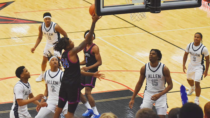 Duncanville's Kaden Harris goes up for a layup during the first quarter of a Class 6A Division I state semifinal game in Coppell. | Cody Thorn
