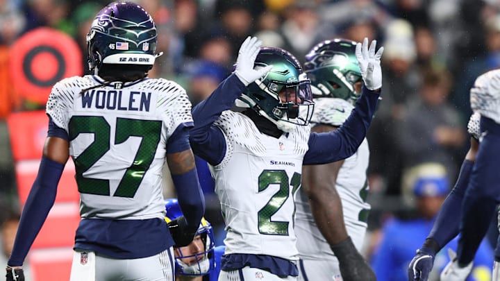 Dec 18, 2025; Seattle, Washington, USA; Seattle Seahawks cornerback Devon Witherspoon (21) reacts in the first half against the Los Angeles Rams at Lumen Field. Mandatory Credit: Kevin Ng-Imagn Images