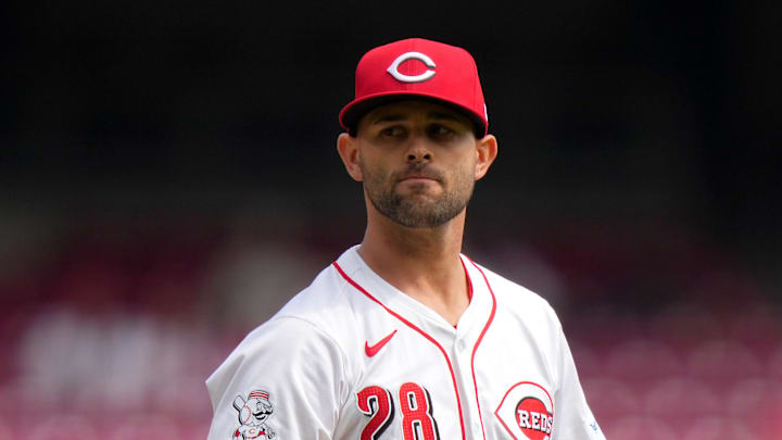 Cincinnati Reds relief pitcher Nick Martinez (28) reacts after striking out the last batter in the fourth inning of a baseball game against the Washington Nationals, Sunday, March 31, 2024, at Great American Ball Park in Cincinnati.