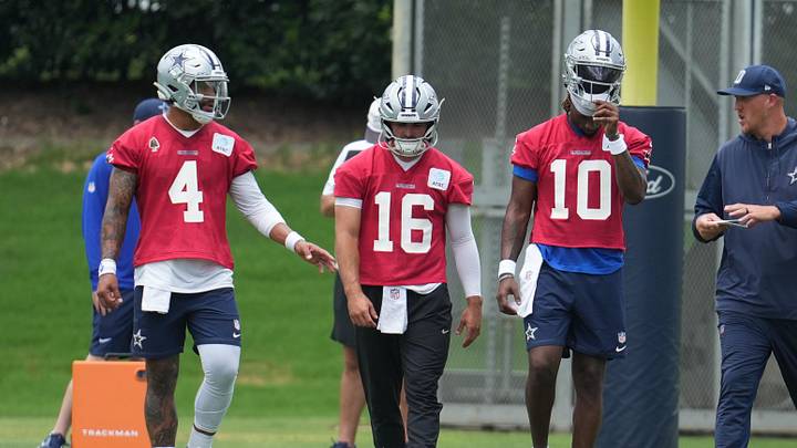 Dallas Cowboys quarterbacks Dak Prescott (4), Sam Howell (16), and Joe Milton III (10).