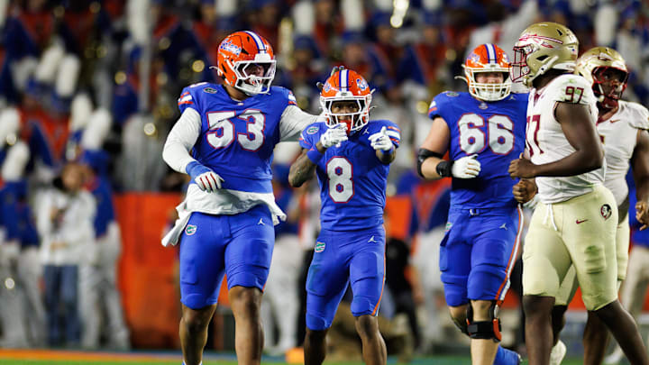 Nov 29, 2025; Gainesville, Florida, USA; Florida Gators wide receiver Vernell Brown III (8) gestures with Florida Gators offensive lineman Bryce Lovett (53) and Florida Gators offensive lineman Jake Slaughter (66) after a first down against the Florida State Seminoles during the first half at Ben Hill Griffin Stadium. Mandatory Credit: Matt Pendleton-Imagn Images Nov 29, 2025; Gainesville, Florida, USA; Florida Gators wide receiver Vernell Brown III (8) gestures with Florida Gators offensive lineman Bryce Lovett (53) and Florida Gators offensive lineman Jake Slaughter (66) after a first down against the Florida State Seminoles during the first half at Ben Hill Griffin Stadium. Mandatory Credit: Matt Pendleton-Imagn Images