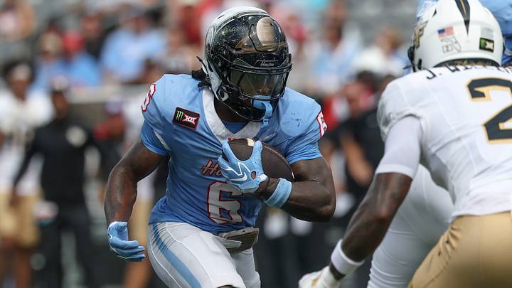 Houston RB Re'shaun Sanford II runs with the ball during the game against UCF at TDECU Stadium. Mandatory Credit: Troy Taormina-Imagn Images Houston RB Re'shaun Sanford II runs with the ball during the game against UCF at TDECU Stadium. Mandatory Credit: Troy Taormina-Imagn Images