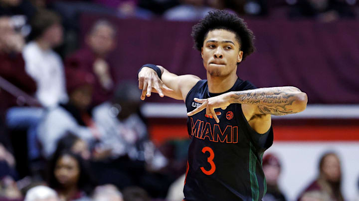Jan 4, 2025; Blacksburg, Virginia, USA; Miami Hurricanes guard Jalil Bethea (3) celebrates after making a three pointer during the first half against the Virginia Tech Hokies at Cassell Coliseum. Mandatory Credit: Peter Casey-Imagn Images