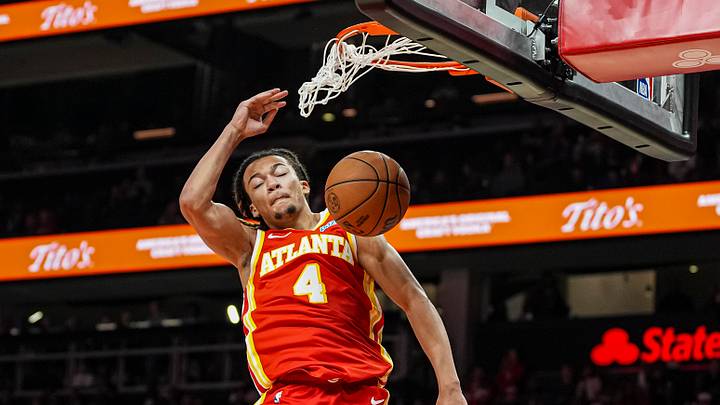 Oct 28, 2026; Atlanta, Georgia, USA; Atlanta Hawks guard Kingston Flemings (4) dunks the ball against the Miami Heat during the second half at State Farm Arena. Oct 28, 2026; Atlanta, Georgia, USA; Atlanta Hawks guard Kingston Flemings (4) dunks the ball against the Miami Heat during the second half at State Farm Arena.
