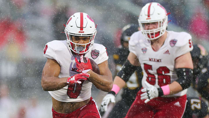 Dec 16, 2023; Orlando, FL, USA;  Miami (OH) Redhawks running back Rashad Amos (0) runs with the ball