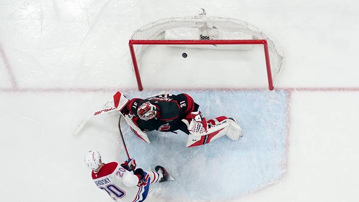 May 21, 2026; Raleigh, North Carolina, USA; Montreal Canadiens left wing Juraj Slafkovsky (20) scores a goal against Carolina Hurricanes goaltender Frederik Andersen (31) during the third period in game one of the Eastern Conferene Final of the 2026 Stanley Cup Playoffs at Lenovo Center. Mandatory Credit: James Guillory-Imagn Images May 21, 2026; Raleigh, North Carolina, USA; Montreal Canadiens left wing Juraj Slafkovsky (20) scores a goal against Carolina Hurricanes goaltender Frederik Andersen (31) during the third period in game one of the Eastern Conferene Final of the 2026 Stanley Cup Playoffs at Lenovo Center. Mandatory Credit: James Guillory-Imagn Images