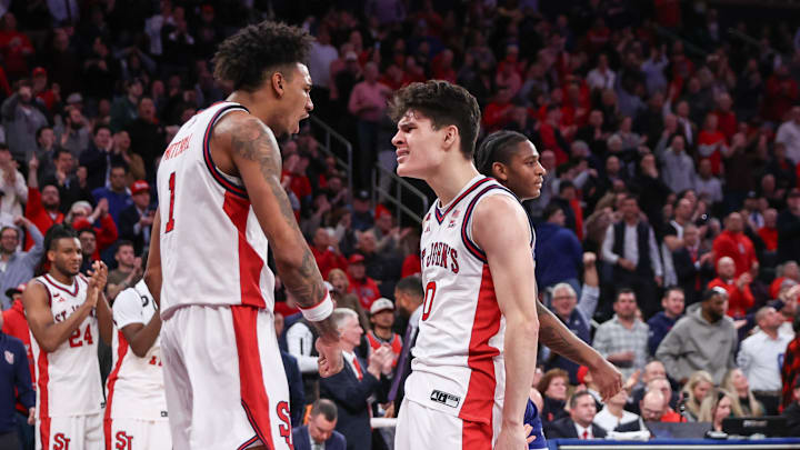 Jan 20, 2026; New York, New York, USA; St. John's basketball forward Dillon Mitchell (1) and guard Dylan Darling (0) celebrate in the second half against the Seton Hall Pirates at Madison Square Garden. Jan 20, 2026; New York, New York, USA; St. John's basketball forward Dillon Mitchell (1) and guard Dylan Darling (0) celebrate in the second half against the Seton Hall Pirates at Madison Square Garden.