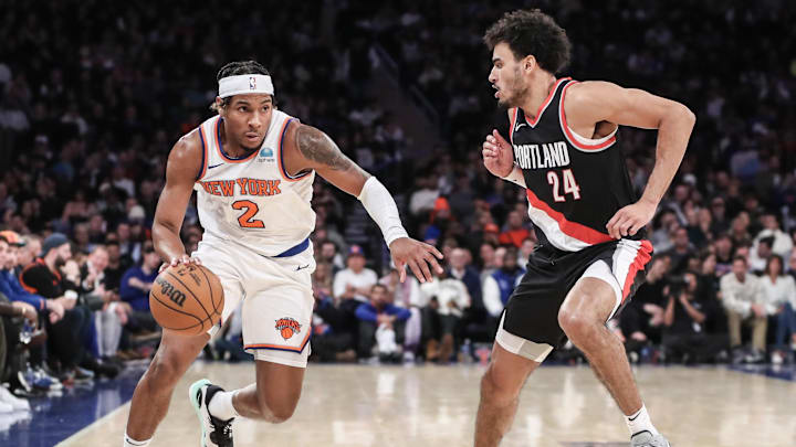 Jan 9, 2024; New York, New York, USA; New York Knicks guard Miles McBride (2) looks to drive past Portland Trail Blazers forward Justin Minaya (24) in the fourth quarter at Madison Square Garden. Mandatory Credit: Wendell Cruz-Imagn Images