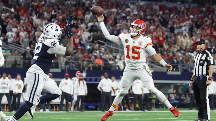 Nov 27, 2025; Arlington, Texas, USA; Kansas City Chiefs quarterback Patrick Mahomes (15) throws a pass for a touchdown against Dallas Cowboys defensive tackle Quinnen Williams (92) during the fourth quarter at AT&T Stadium. Mandatory Credit: Kevin Jairaj-Imagn Images