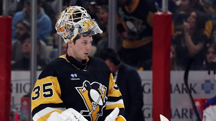 Mar 10, 2024; Pittsburgh, Pennsylvania, USA;  Pittsburgh Penguins goaltender Tristan Jarry (35) returns to his net after a time-out against the Edmonton Oilers during the second period at PPG Paints Arena. The Oilers won 4-0. Mandatory Credit: Charles LeClaire-Imagn Images